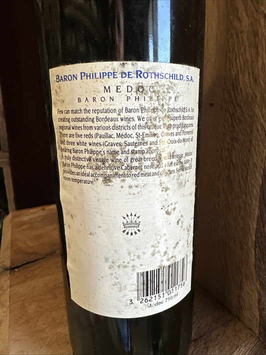 Baron Philipe de Rothschild Medoc (label in poor condition but wine looks fine)
