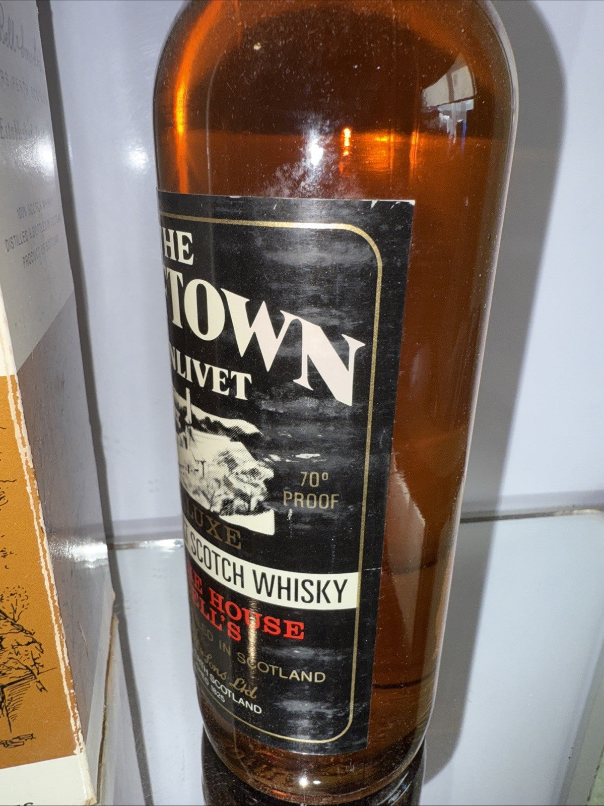 The Dufftown  Glenlivet Deluxe Highland Malt 8 year old Whisky 1970s bottle