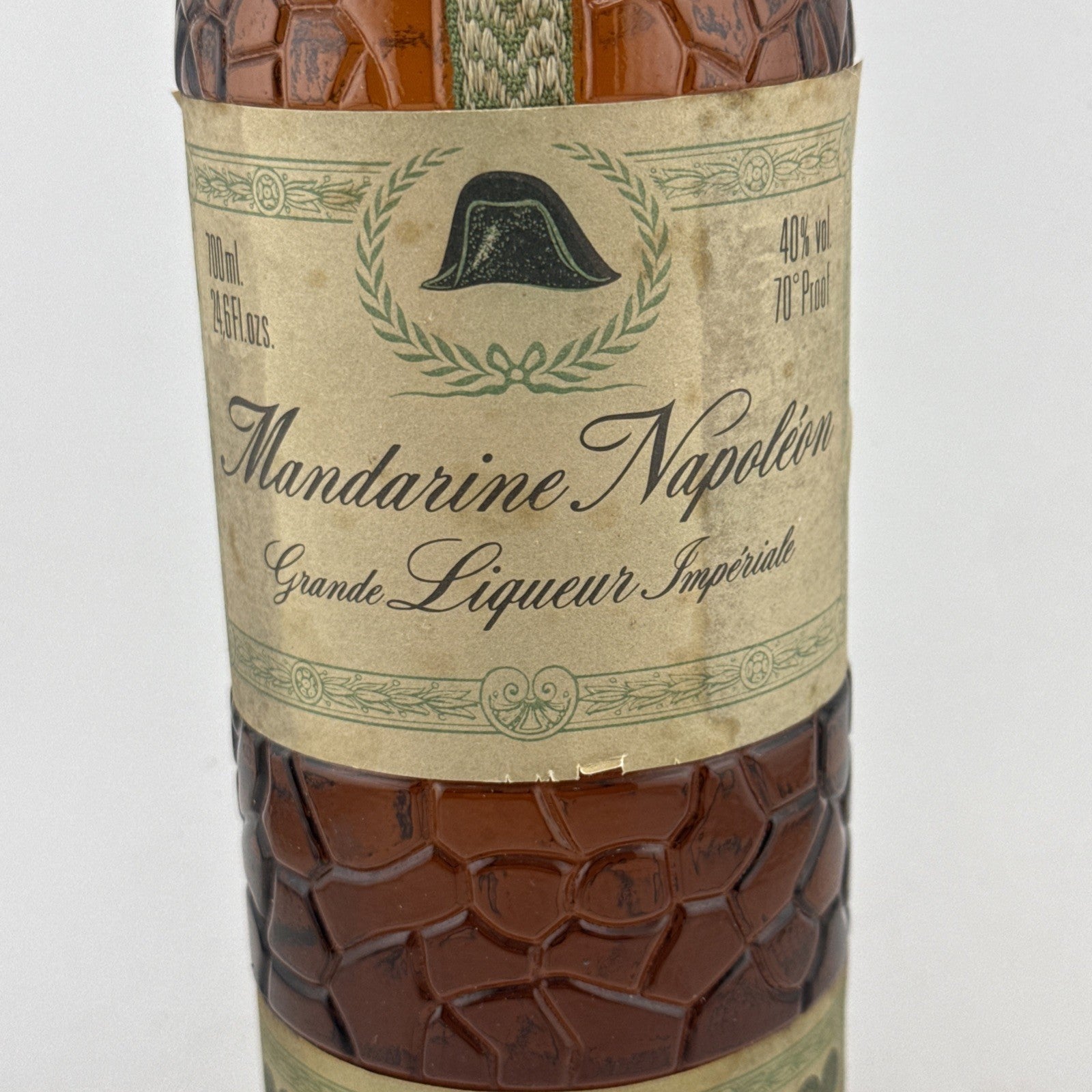 Mandarine Napoléon Liqueur; textured "citrus skin" bottle from the 1970s