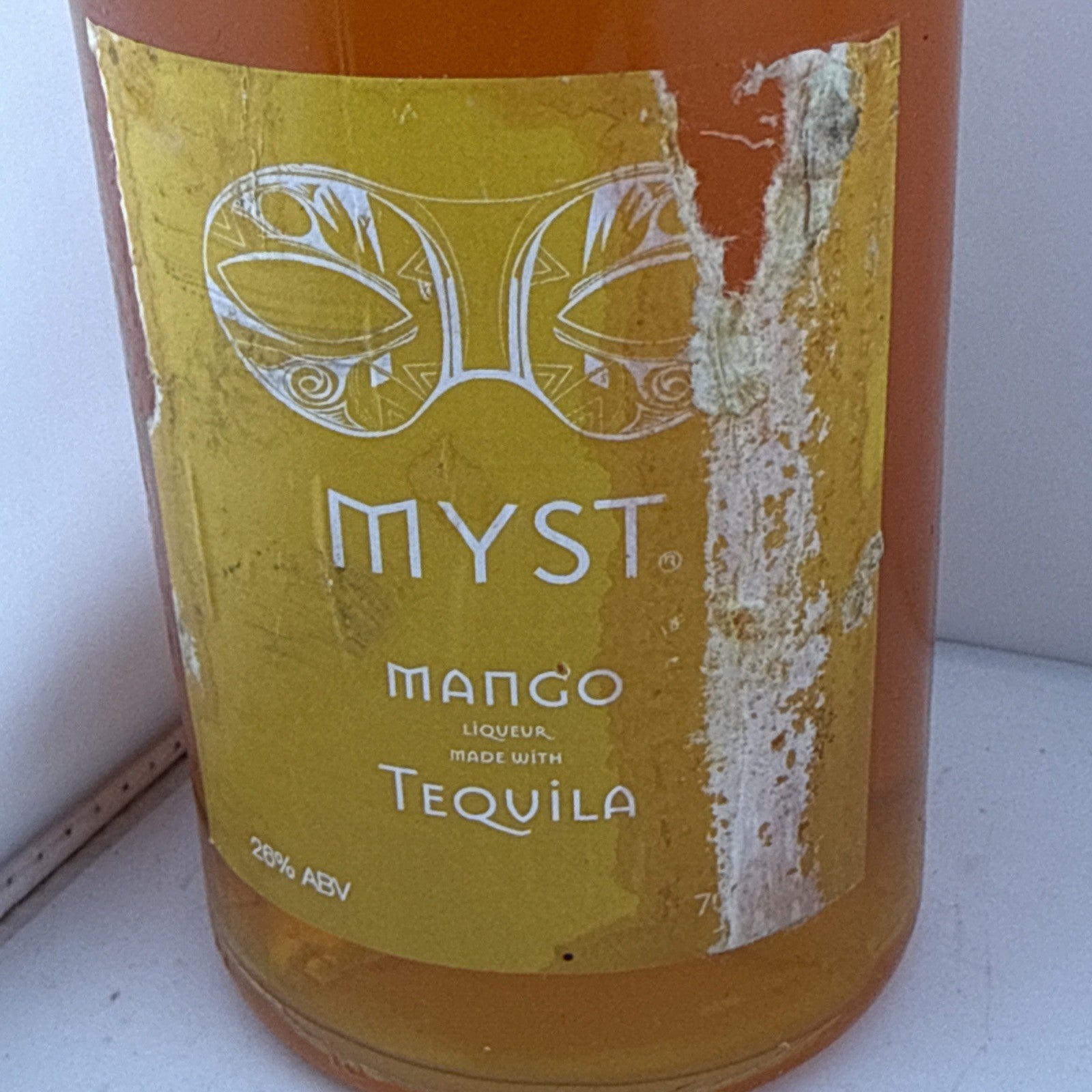 Myst Mango Liqueur made with Tequila. 70cl, 26% ABV. 0poor Label Condition