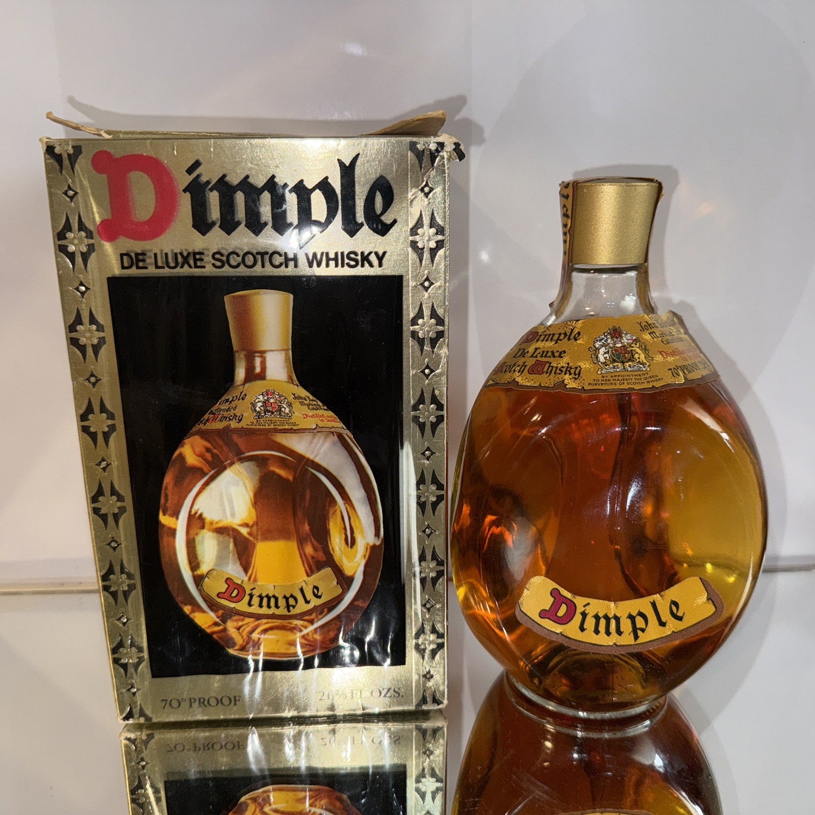 1970s Bottle Haigs' Dimple 26 2/3 FL OZ And 70% proof vintage matured