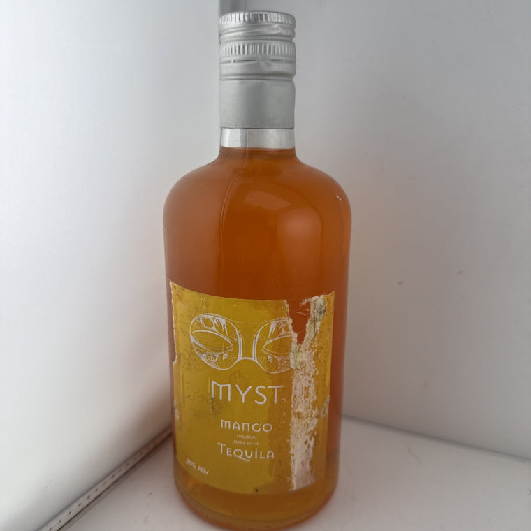 Myst Mango Liqueur made with Tequila. 70cl, 26% ABV. 0poor Label Condition