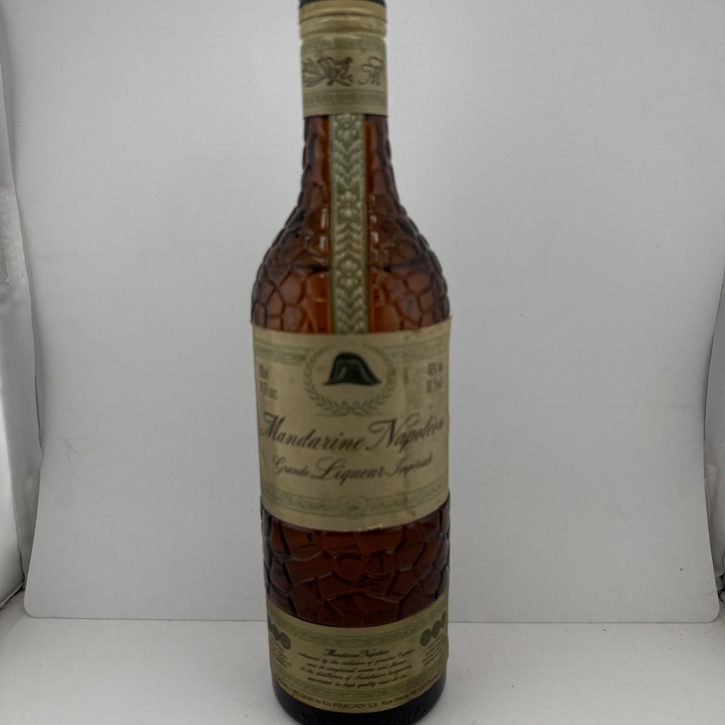 Mandarine Napoléon Liqueur; textured "citrus skin" bottle from the 1970s