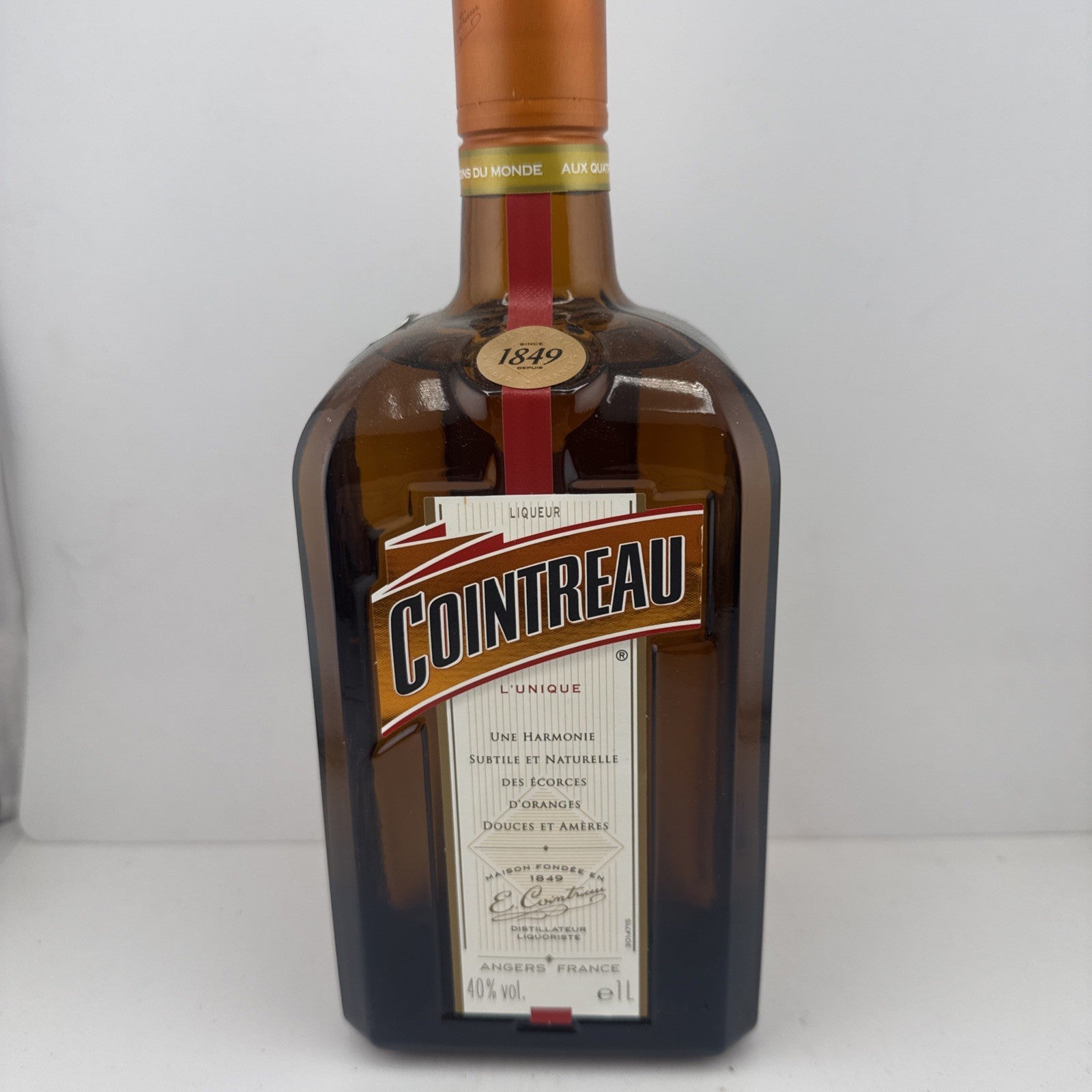 1L Cointreau bottle; label style dates it to the early to mid-2010s.