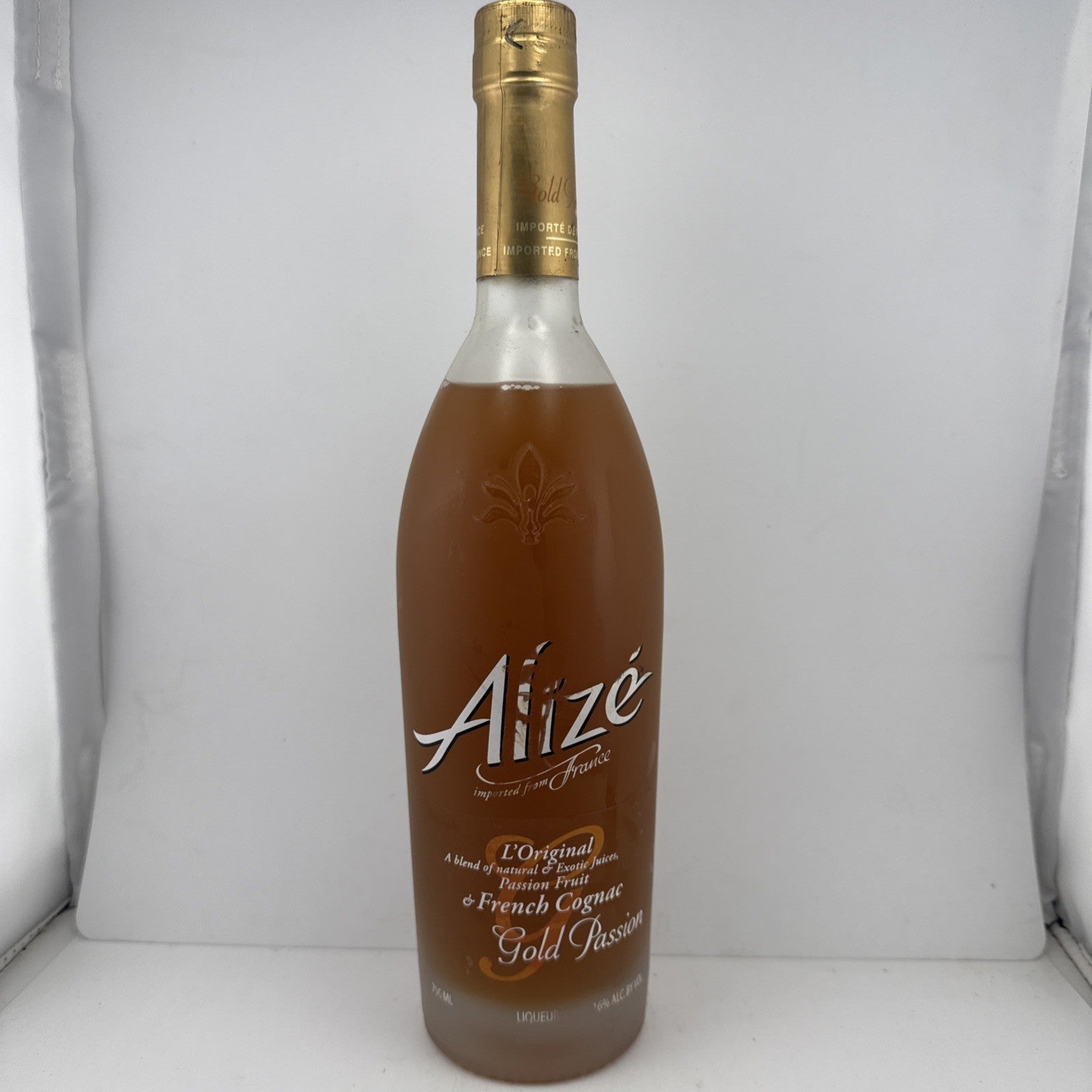 Alizé Gold Passion Liqueur (750ml); classic frosted bottle from the 2010s.