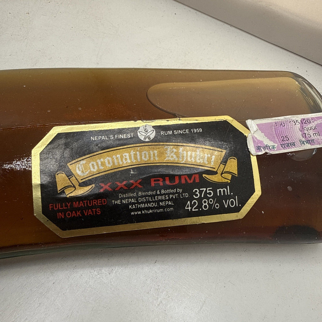 Old Coronation Rum From Nepal in Glass dagger bottle 375ml 42.8 % Very Rare !
