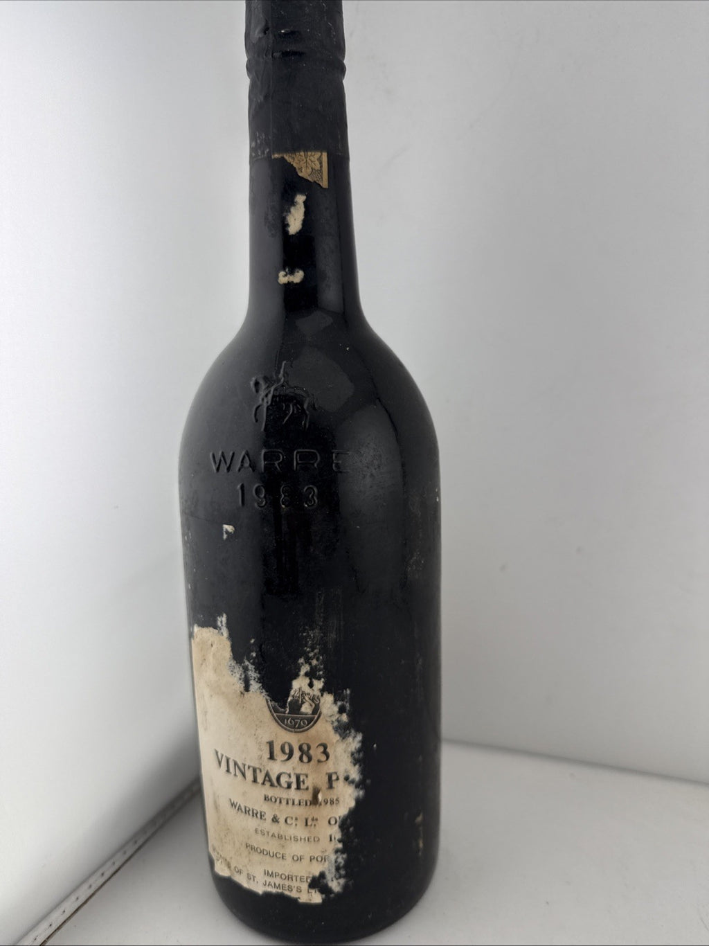 Warre’s 1983 Vintage Port, bottled 1985, sealed damaged label Good Level