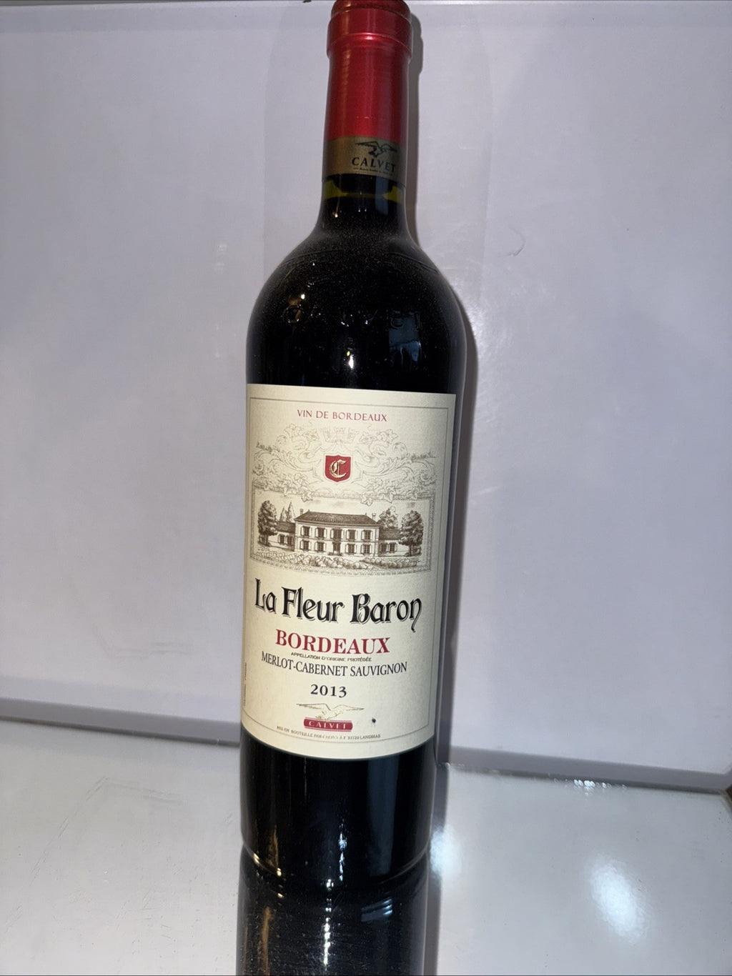 (750 ml) bottle of Calvet La Fleur Baron Bordeaux AOC 2013