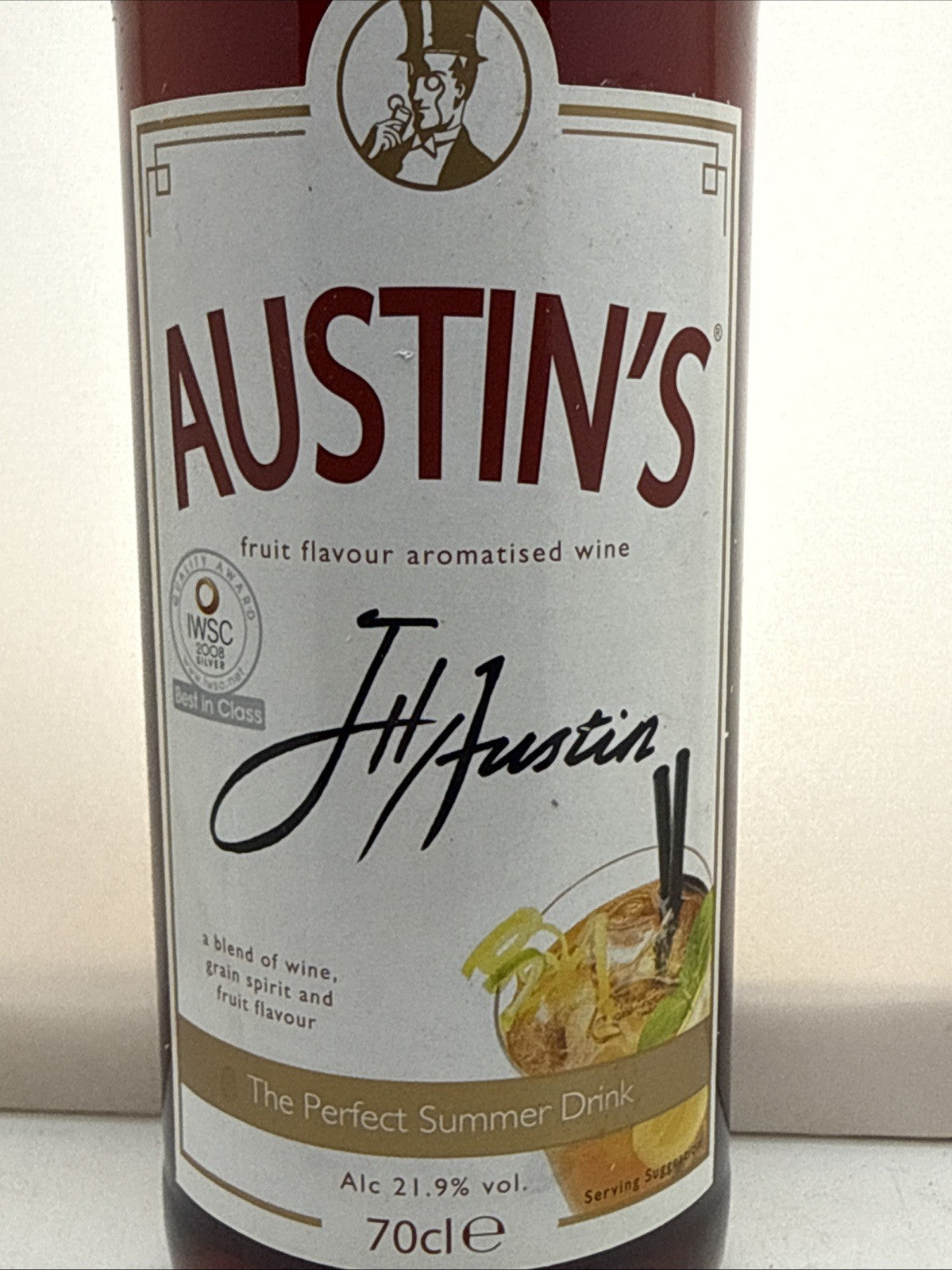 Austin's Aromatised Fruit Wine — 21.9%. Late 2000s bottling. Sealed.like Pimms