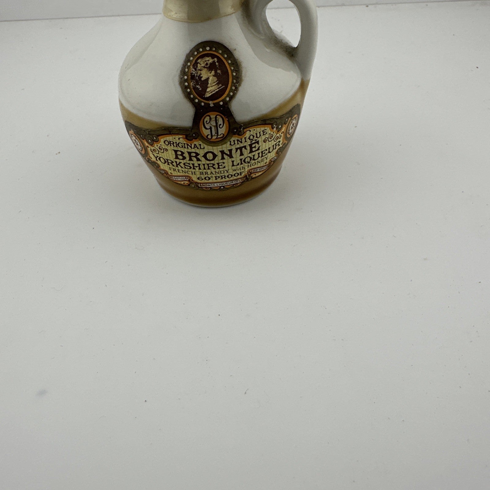 a vintage Bronte Original Unique Yorkshire Liqueur stoneware miniature jug