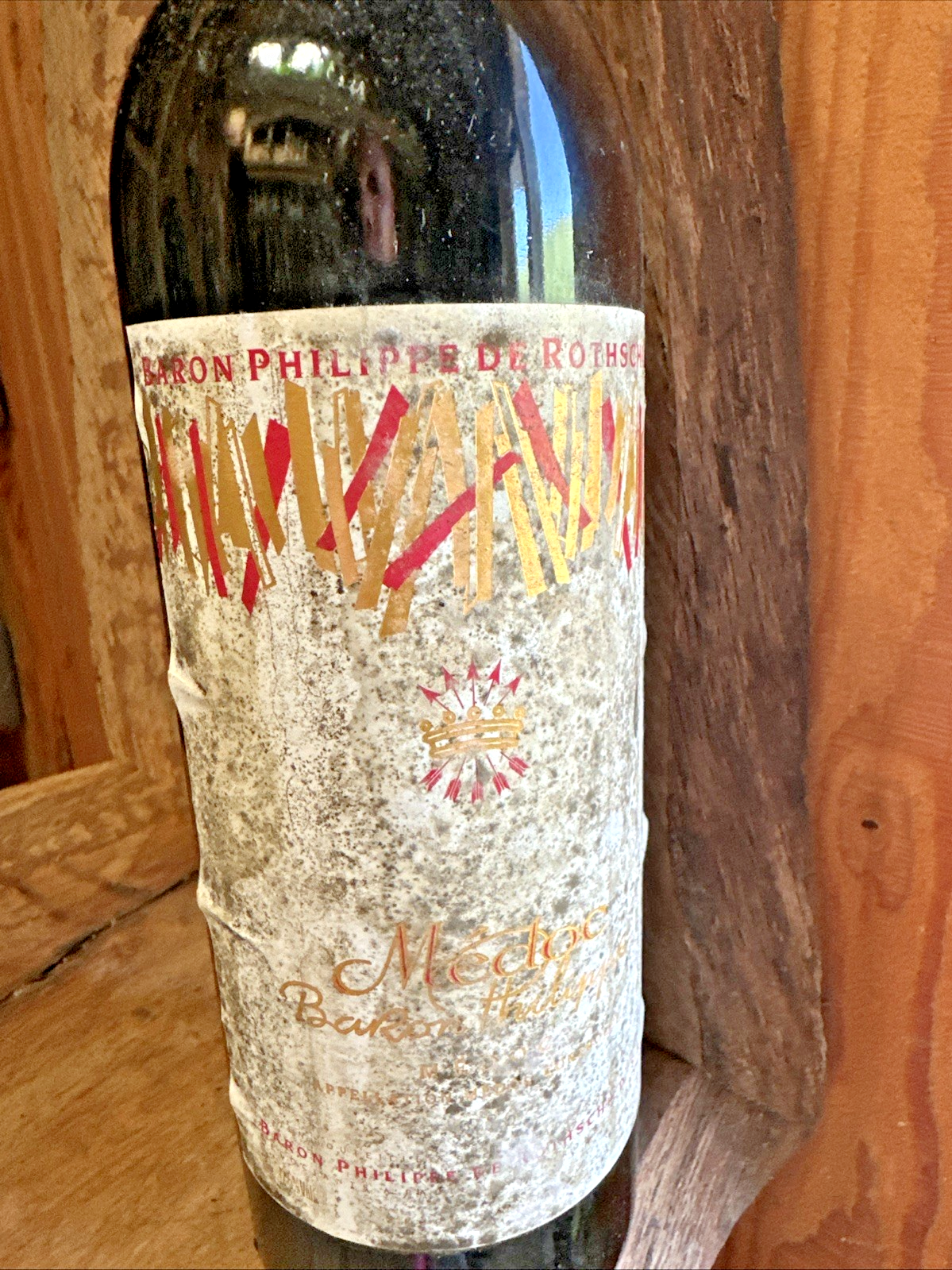 Baron Philipe de Rothschild Medoc (label in poor condition but wine looks fine)