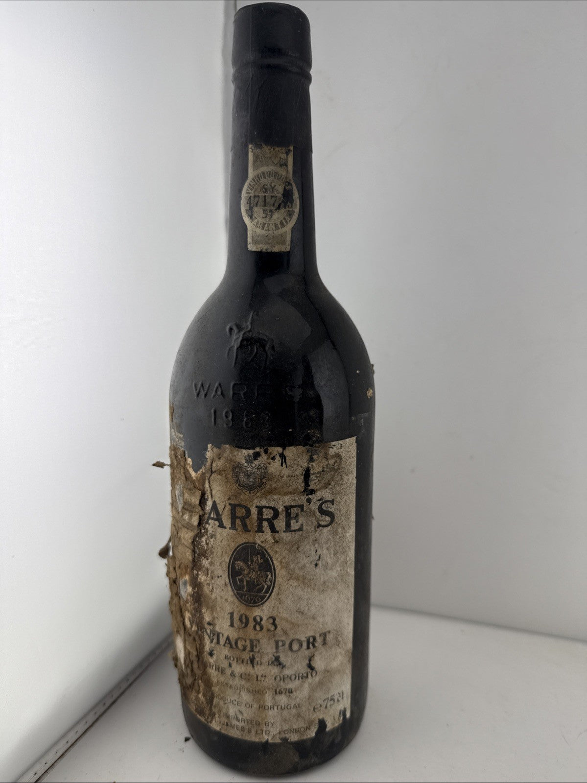 Warre’s 1983 Vintage Port, bottled 1985, sealed damaged label Good Level