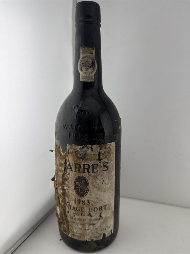 Warre’s 1983 Vintage Port, bottled 1985, sealed damaged label Good Level