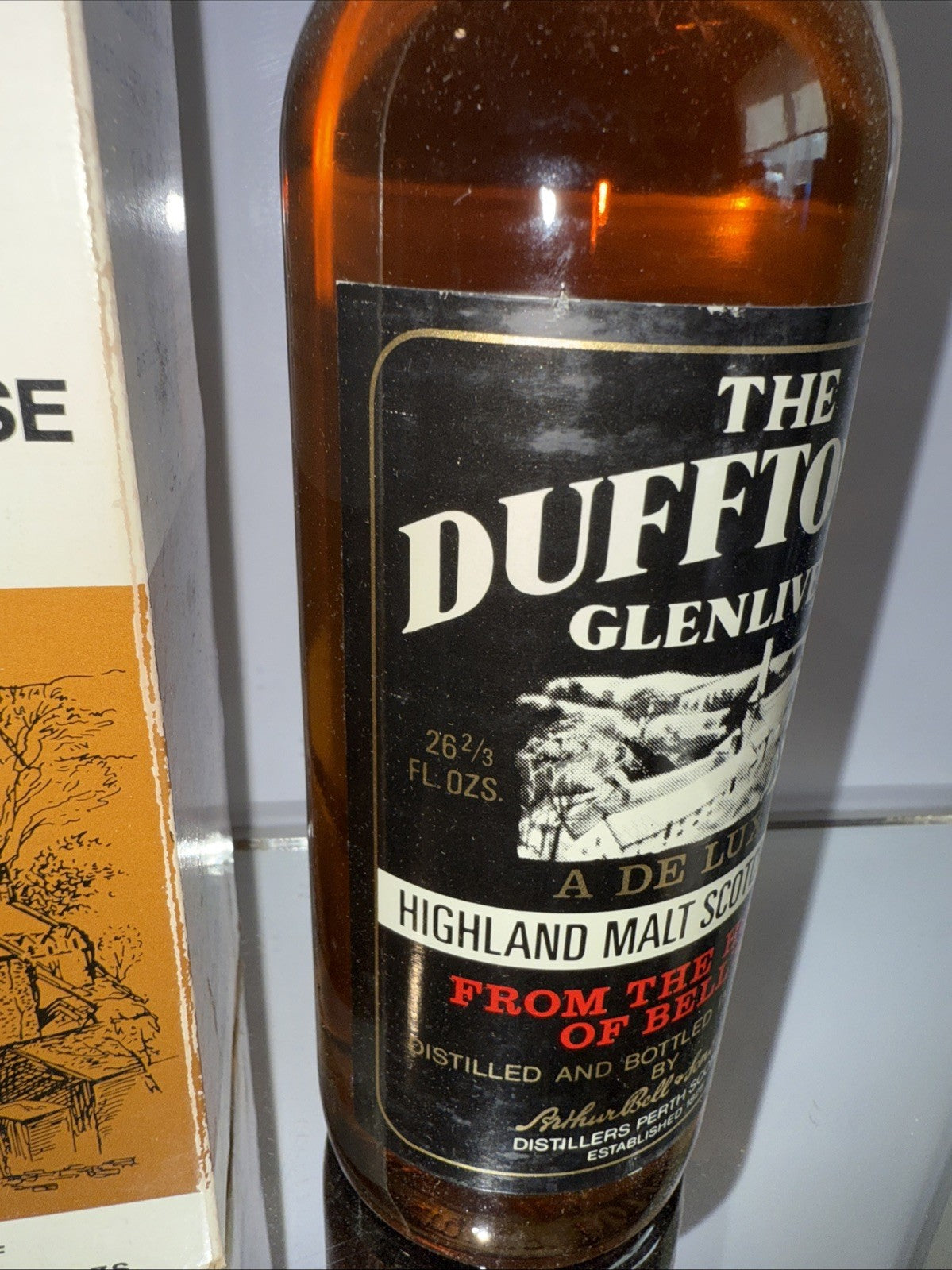 The Dufftown  Glenlivet Deluxe Highland Malt 8 year old Whisky 1970s bottle