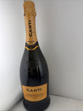 Sealed 2018 vintage Canti Prosecco DOC Millesimato in distinctive black bottle.