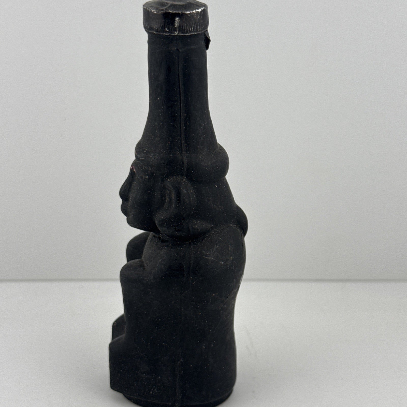 1950s–60s black glass figural bottle miniature, full