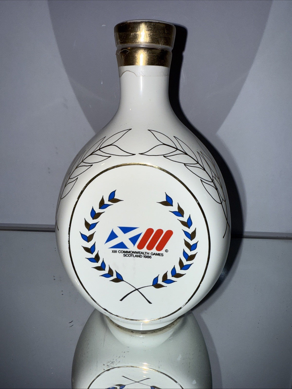 Haig's dimple White Ceramic Decanter from 1986 Commonwealth Games