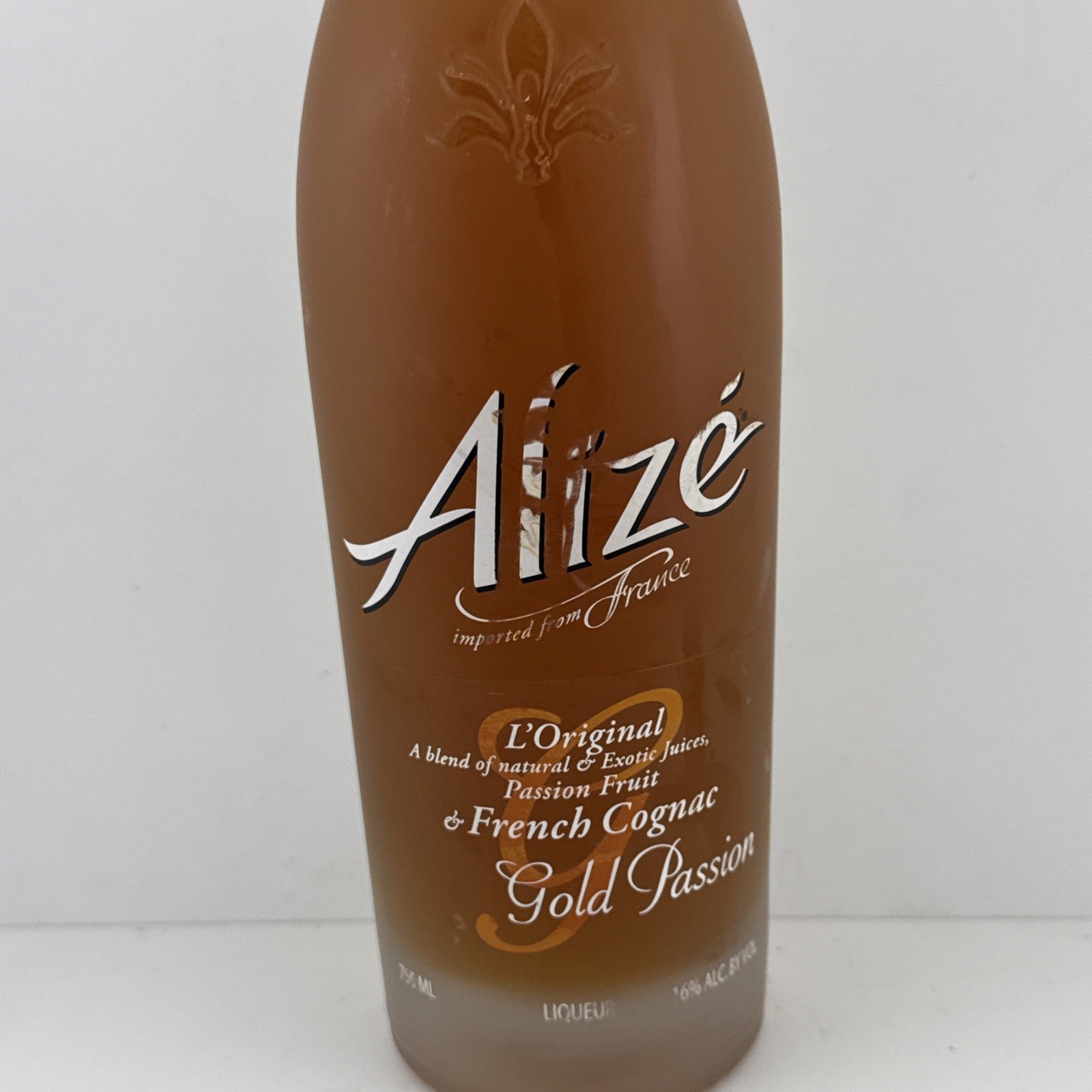 Alizé Gold Passion Liqueur (750ml); classic frosted bottle from the 2010s.