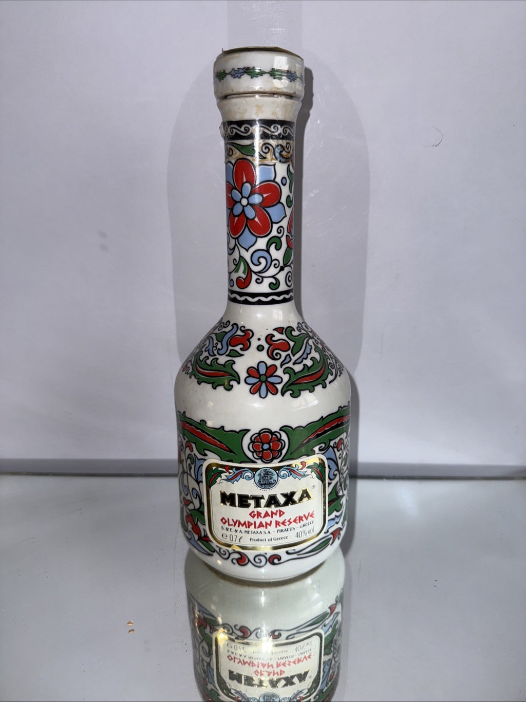 ceramic decanter of Metaxa Grand Olympian Reserve (70cl, 40% ABV) Vintage 1988