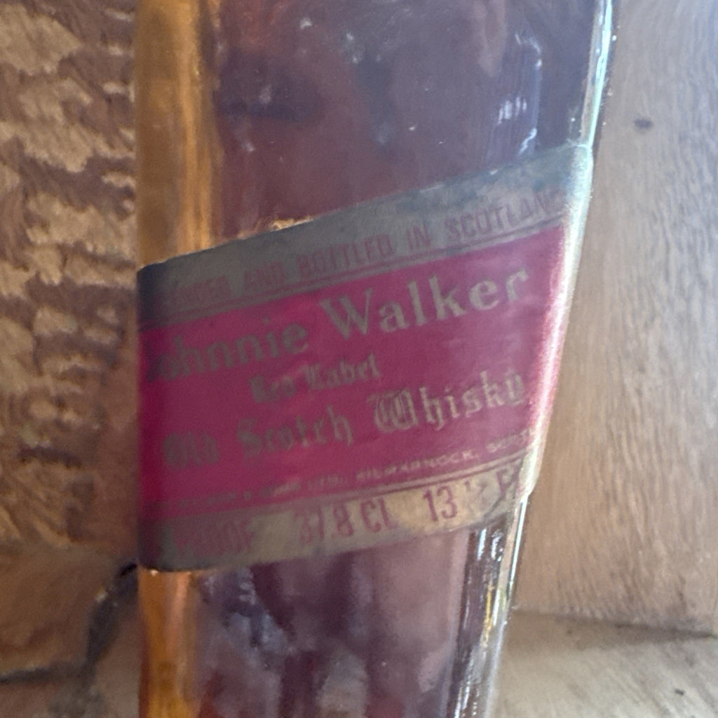 Jonnie Walker red Lable 1/2 bottle 70 % proof 13 1/3 whisky