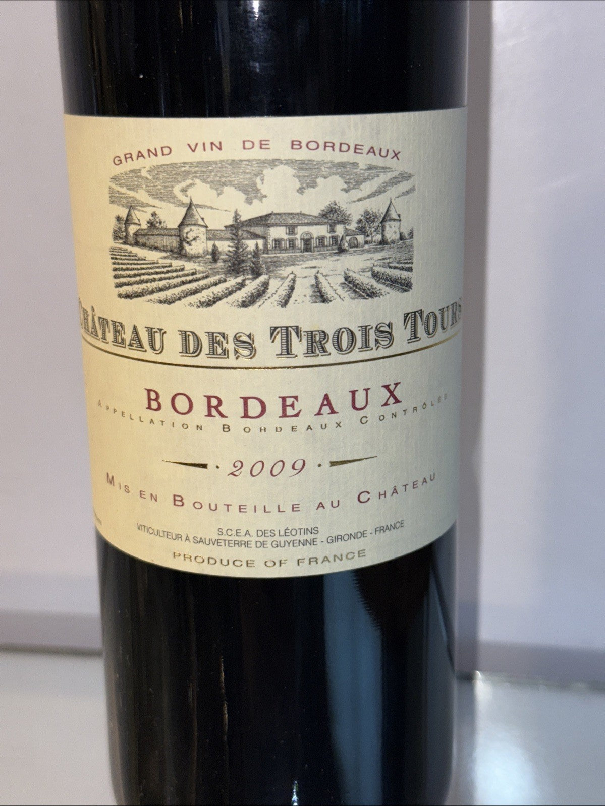 (750 ml) bottle of Château des Trois Tours Bordeaux AOC 2009
