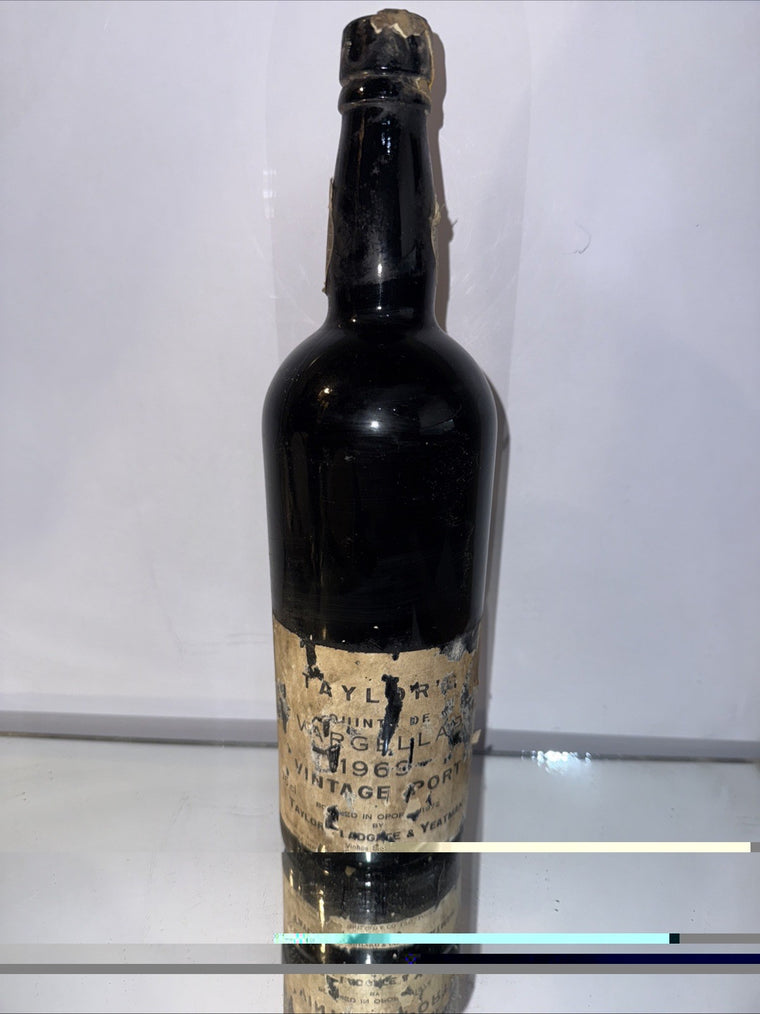 Taylor's 1969 Vintage Port ( Very High Level Wax Top Slight Damage As Photo)