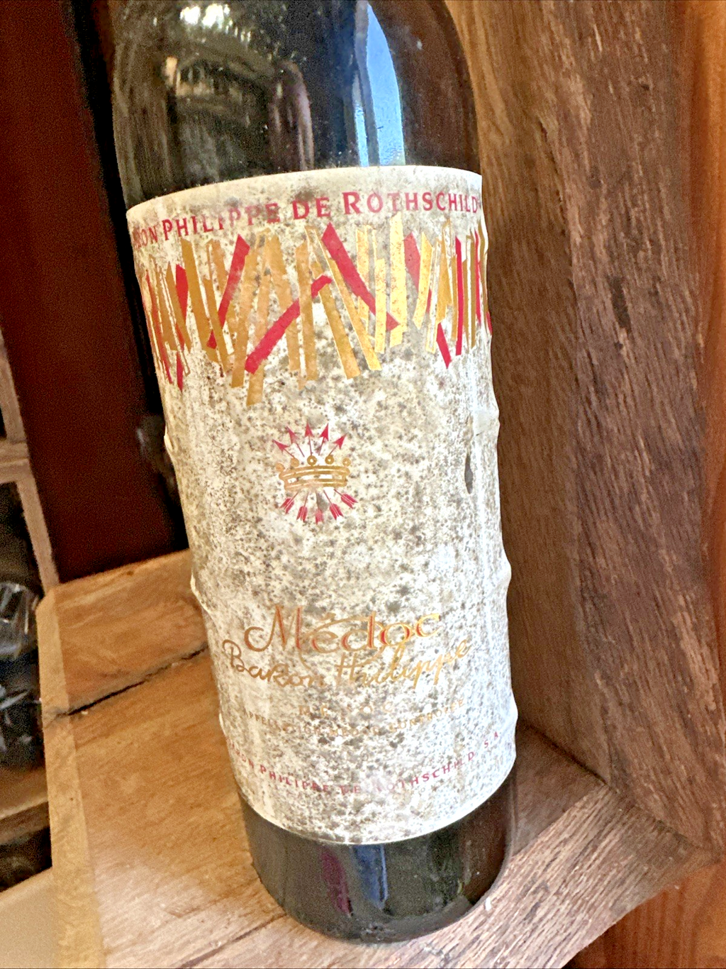 Baron Philipe de Rothschild Medoc (label in poor condition but wine looks fine)