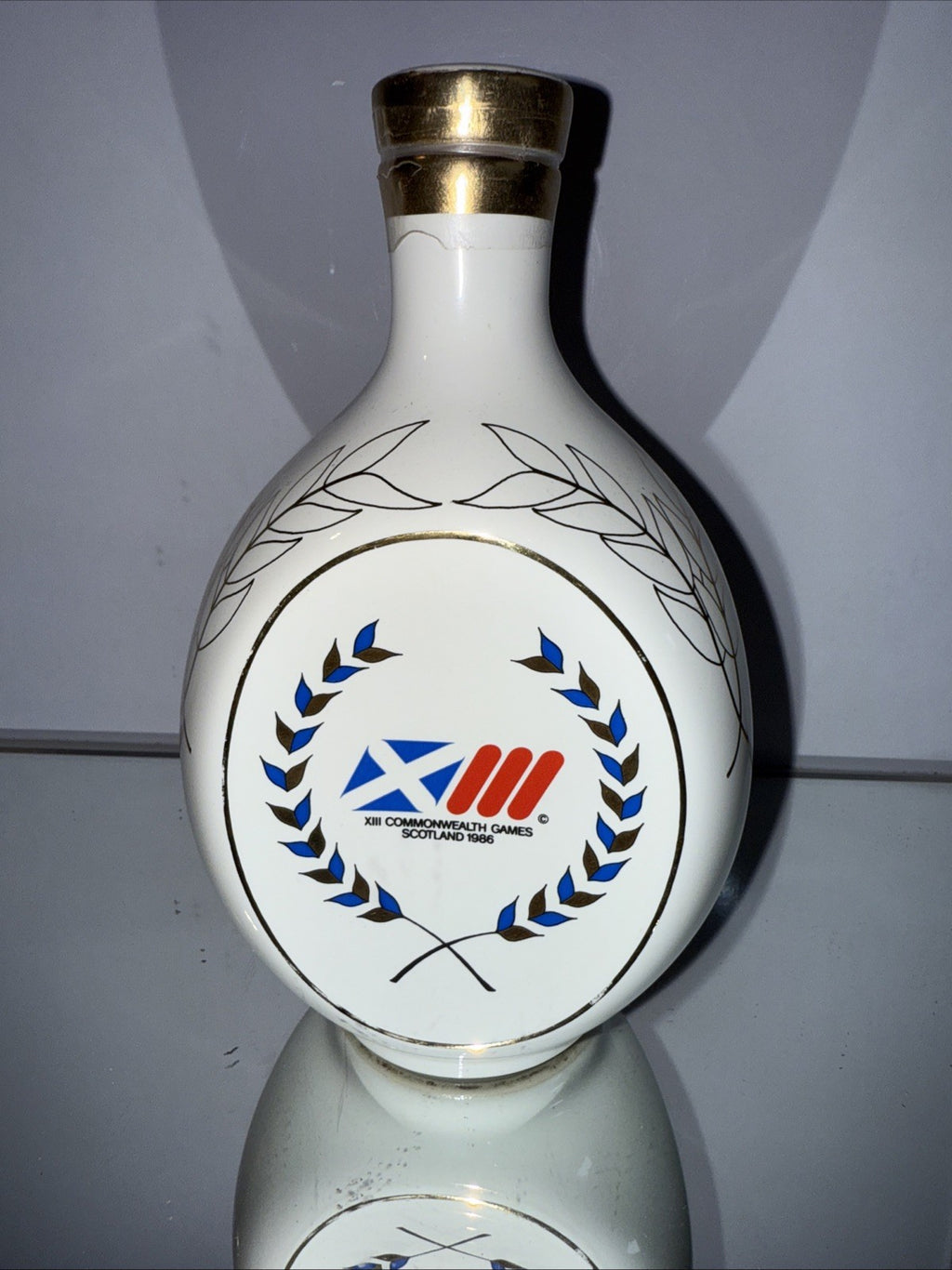 Haig's dimple White Ceramic Decanter from 1986 Commonwealth Games