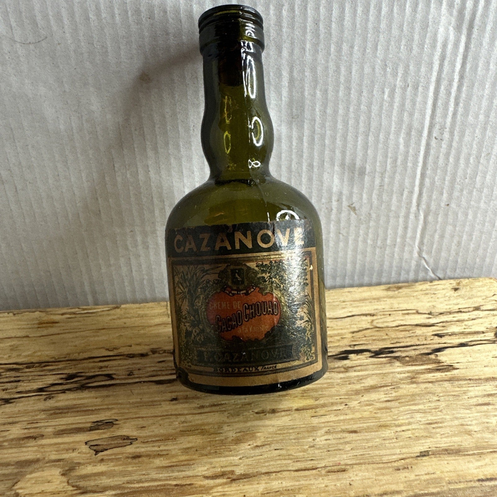 Cazanove Crème de Cacao Chouao, a chocolate and vanilla liqueur miniature. Empty