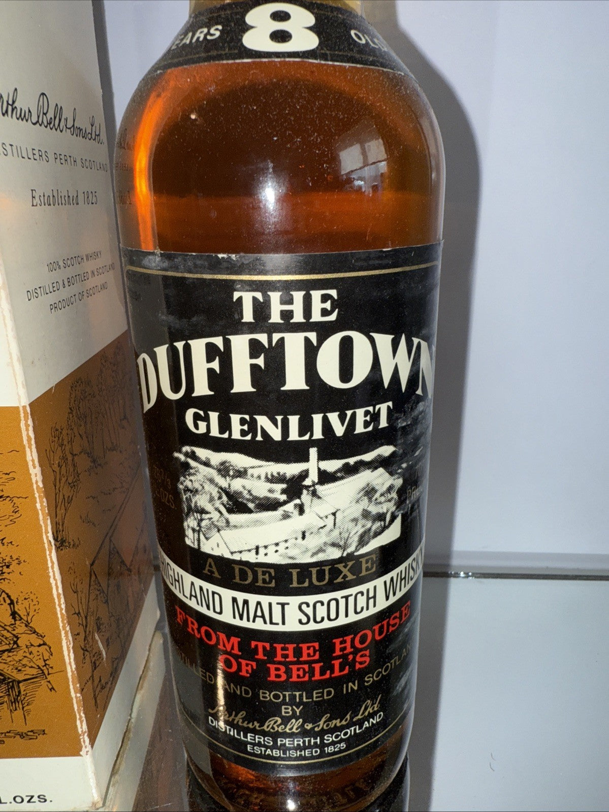 The Dufftown  Glenlivet Deluxe Highland Malt 8 year old Whisky 1970s bottle